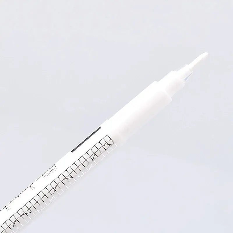 Set Marker alb + riglă de măsurat image 1